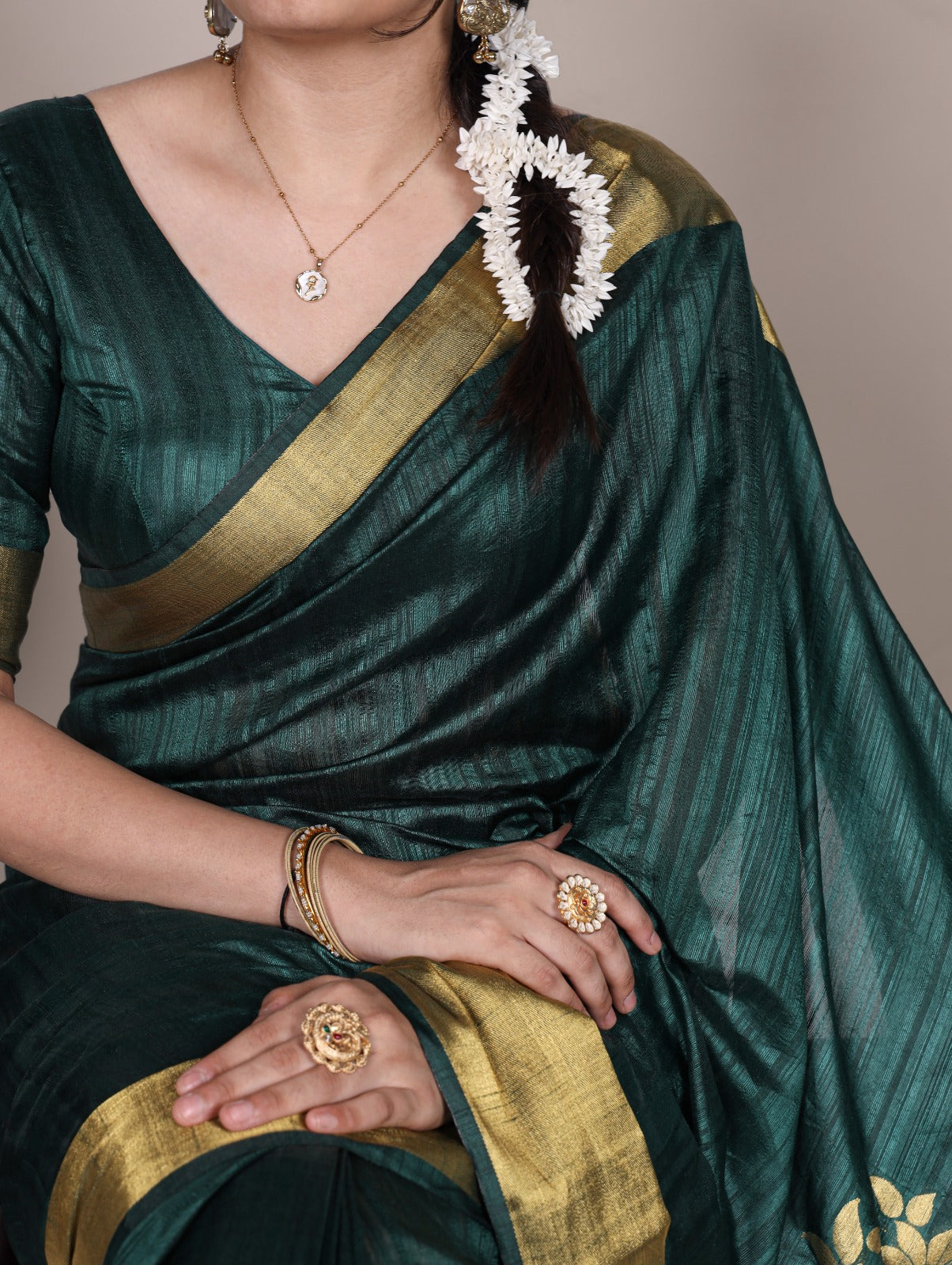 Dressing up for Onam in a raw silk saree