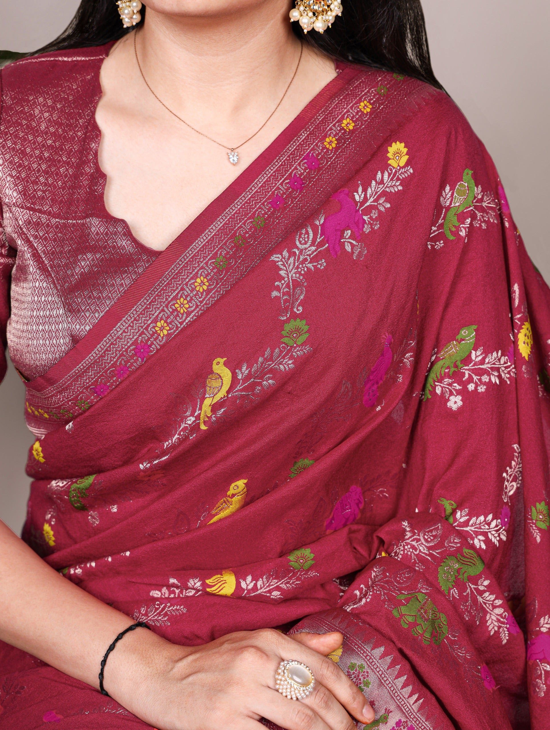 Naylon Easy drape, rich colors, and detailed weaving Saree