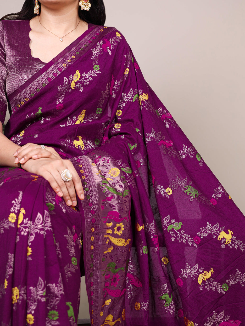 Naylon Easy drape, rich colors, and detailed weaving Saree