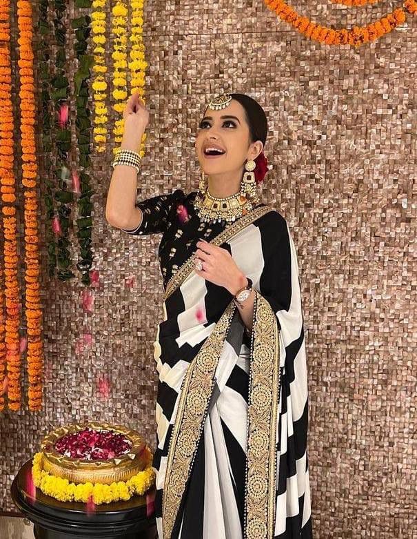 Faux Georgette Black and White Saree