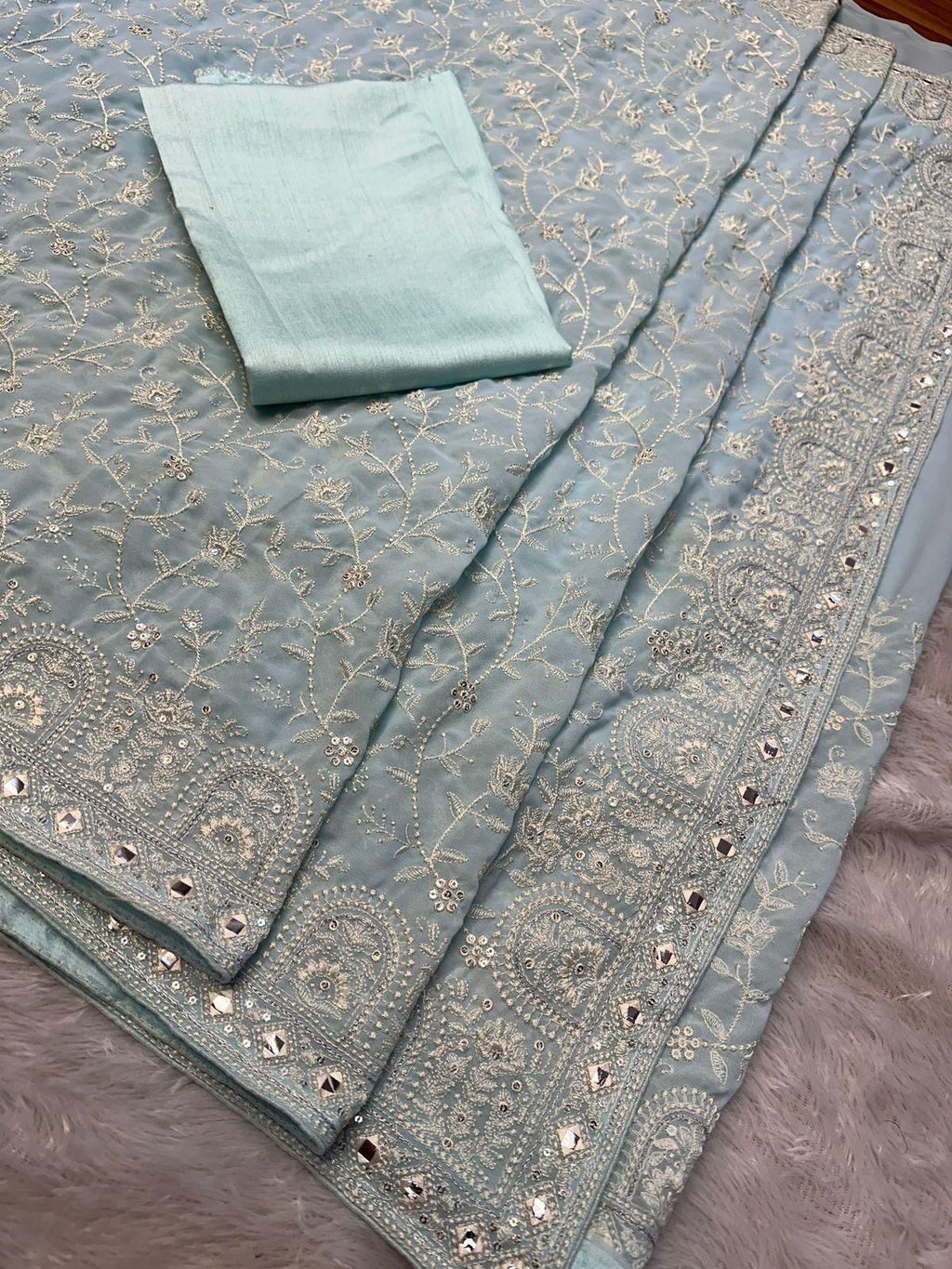 Faux geogert saree with white thread & seqnce