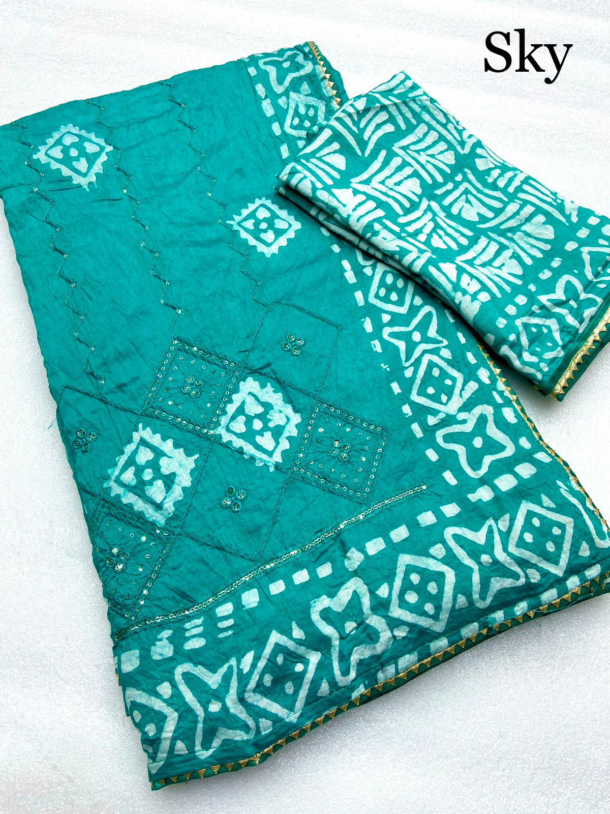 batik print seqance star saree