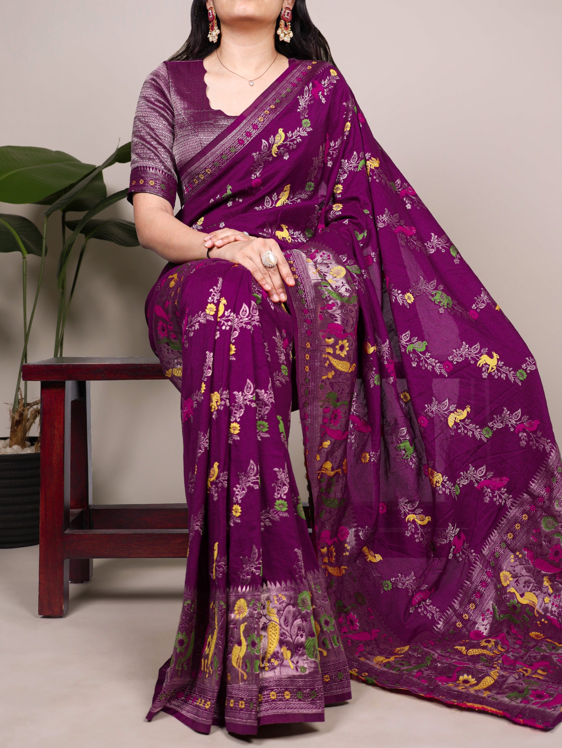 Naylon Easy drape, rich colors, and detailed weaving Saree