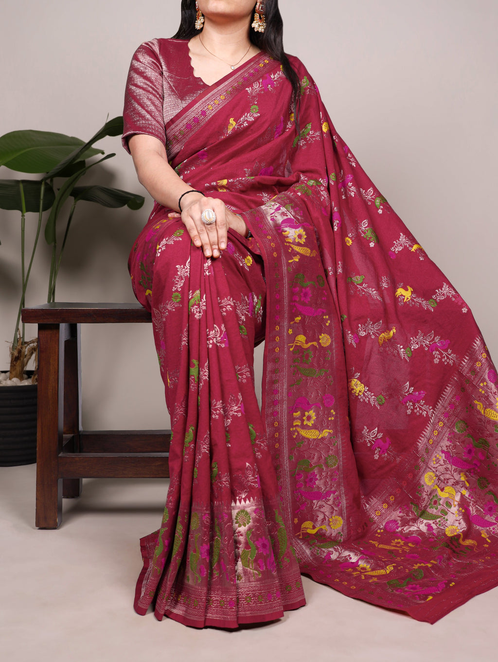 Naylon Easy drape, rich colors, and detailed weaving Saree