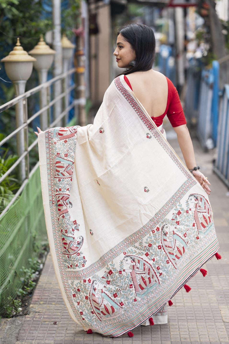 Soft Linen Saree With Madhubani Prints.