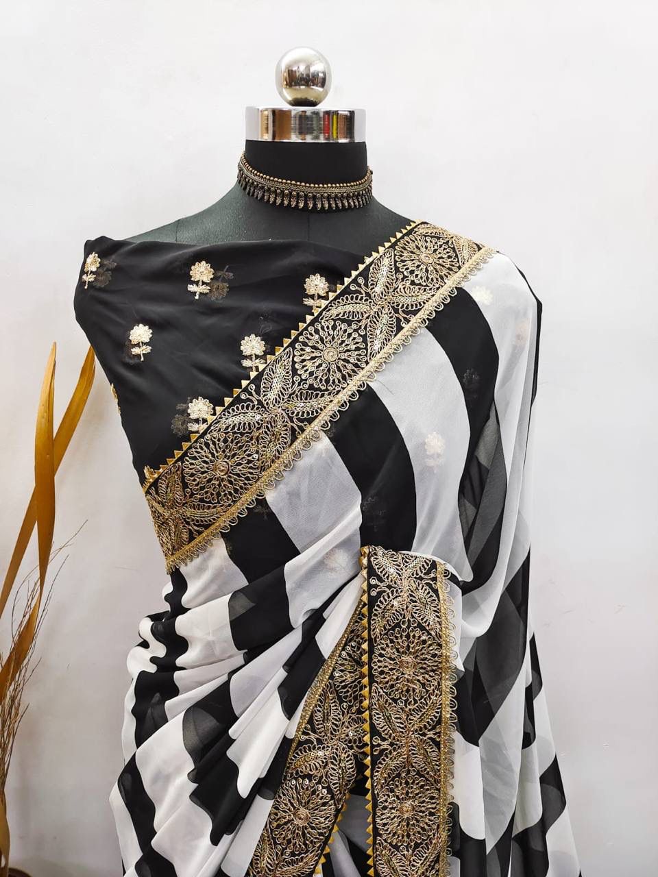 Faux Georgette Black and White Saree