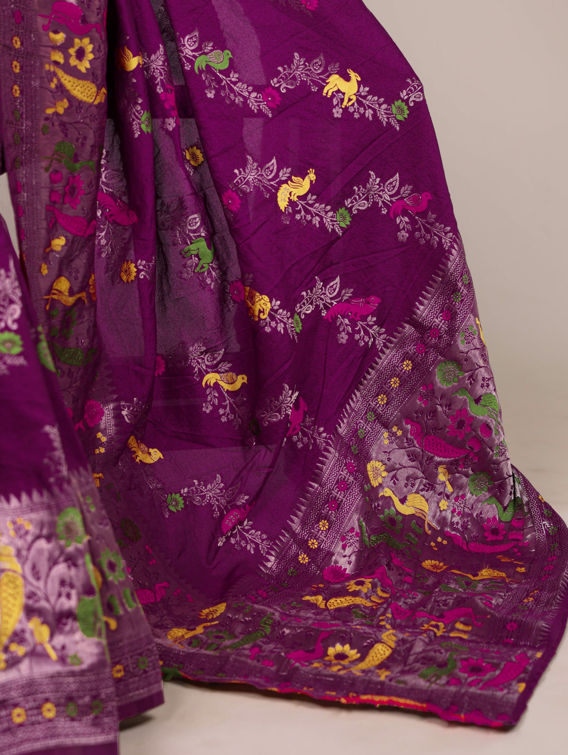 Naylon Easy drape, rich colors, and detailed weaving Saree
